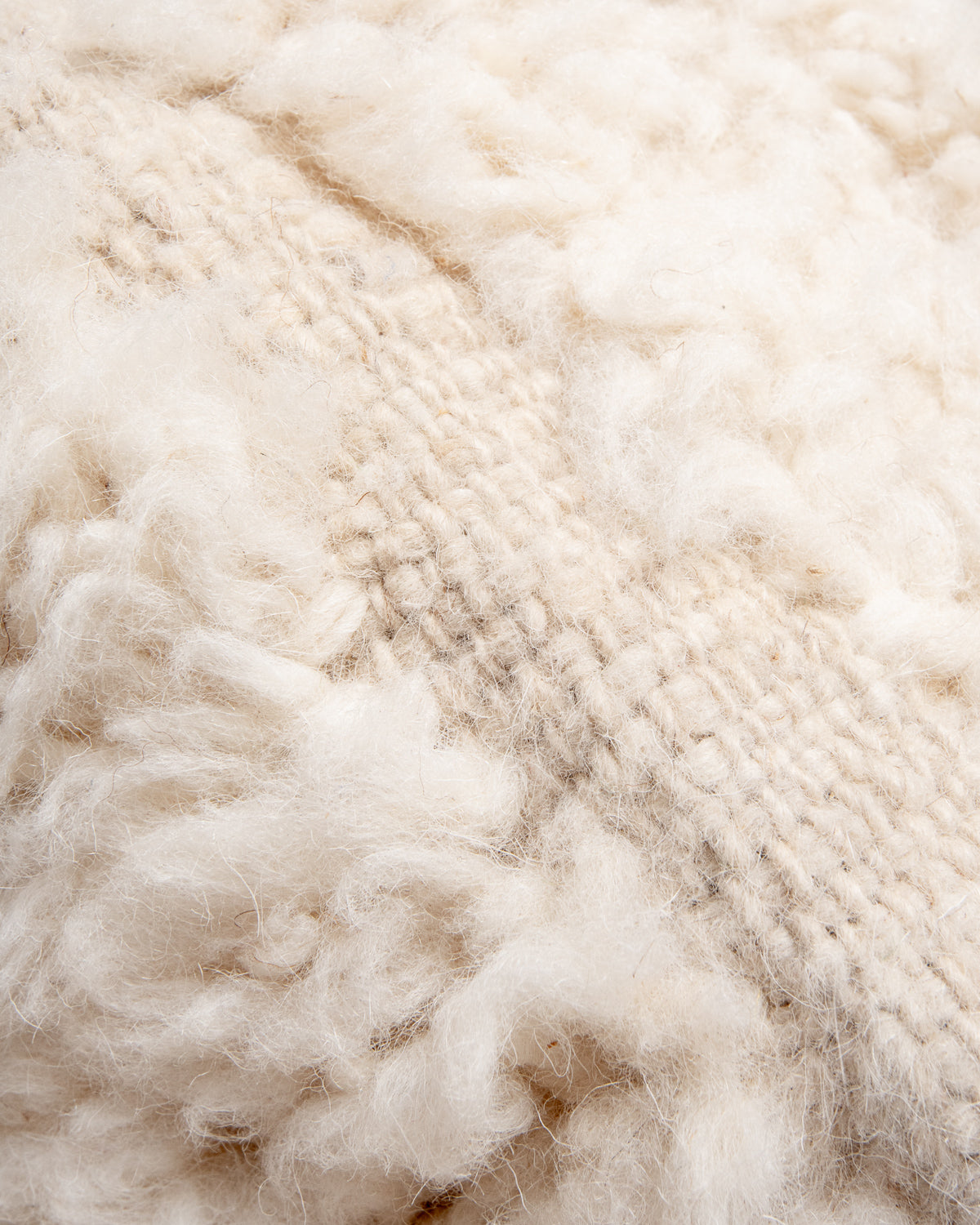Modern, designer, handcrafted Berber rug from Morocco. Beniourain carpet with minimalist design, natural wool pile and a fluffy texture.